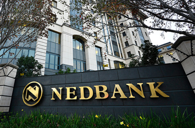A Nedbank sign outside an office building.